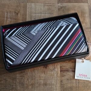 Trina Turk Black and White Geometric Wallet with Colorful Stripes.